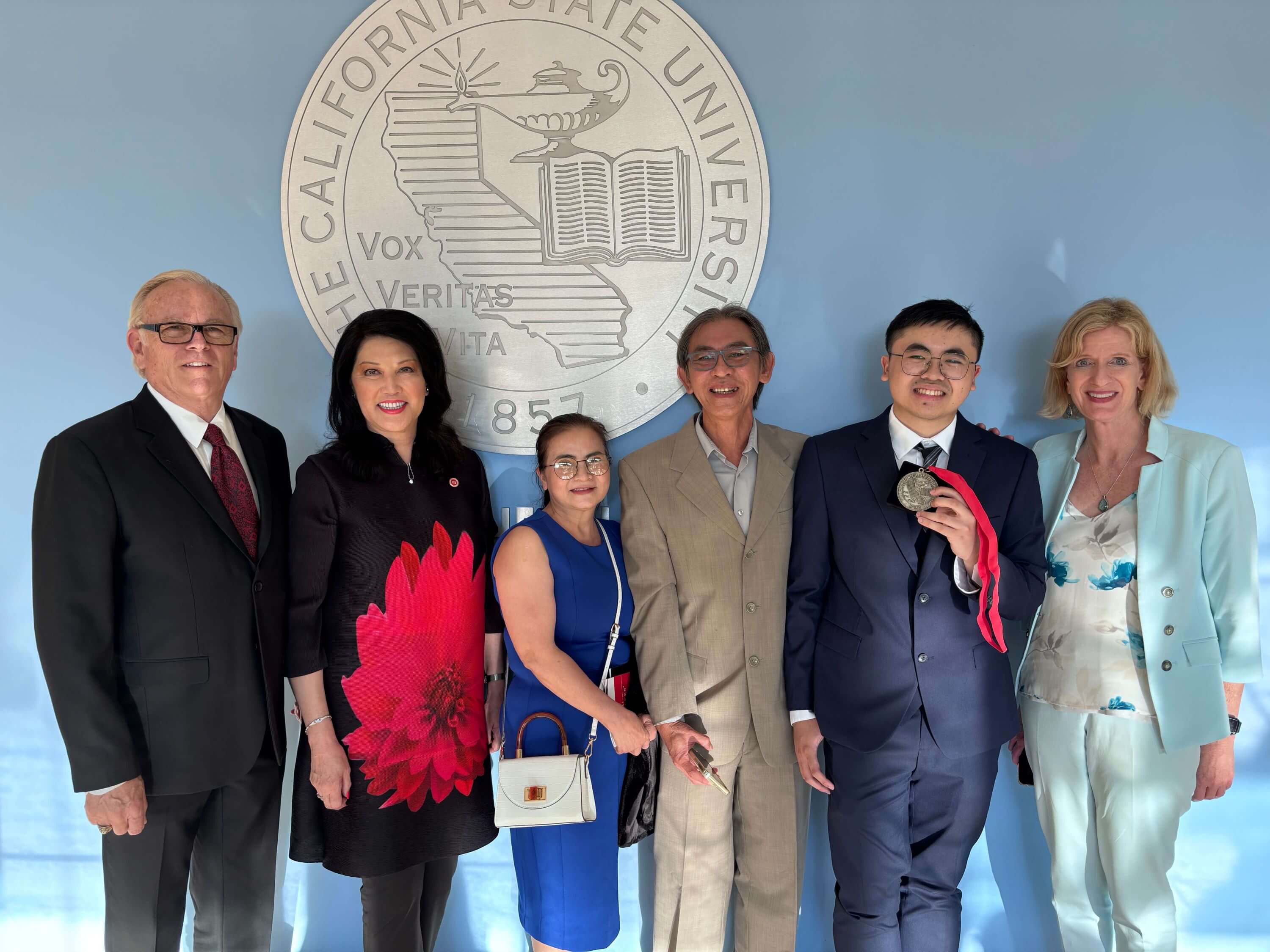 wenda fong and dan fetterly with scholarship recipient