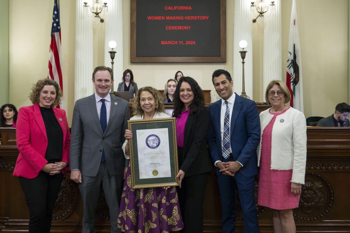 chancellor garcia holding a plaque