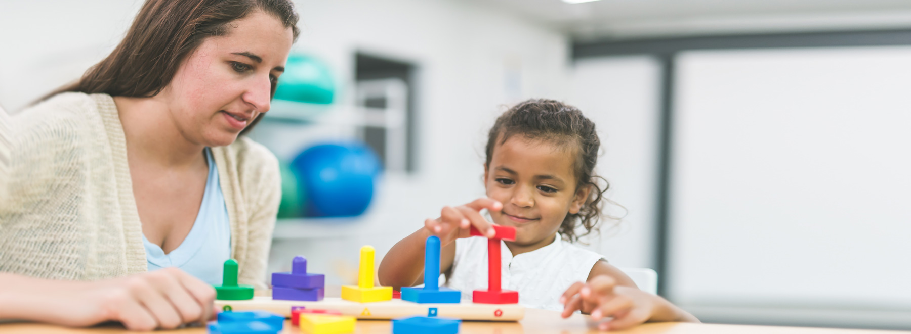 Occupational Therapist working with a child