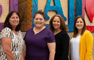 women smiling for camera