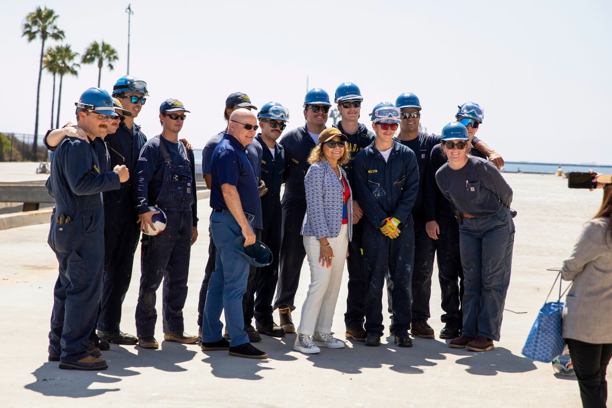 Chancellor García poses with Cal Maritime cadets during a special tour of the university’s Training Ship Golden Bear (TSGB) when it docked in San Pedro July 30, 2024.