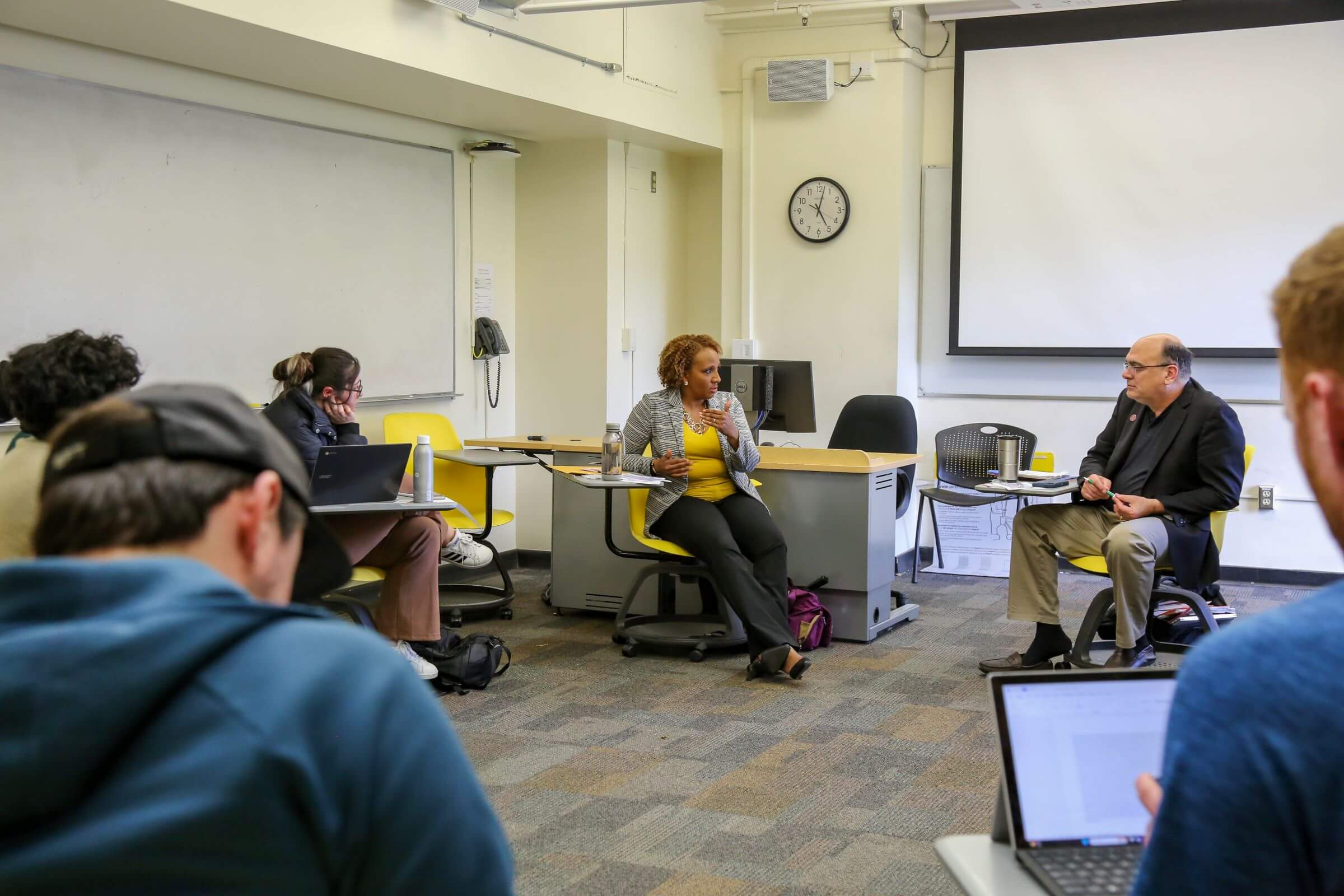 The Ventura County Registrar of Voters ​​​​Michelle Ascencion visits with CSUCI Professor Tim Allison and his class.