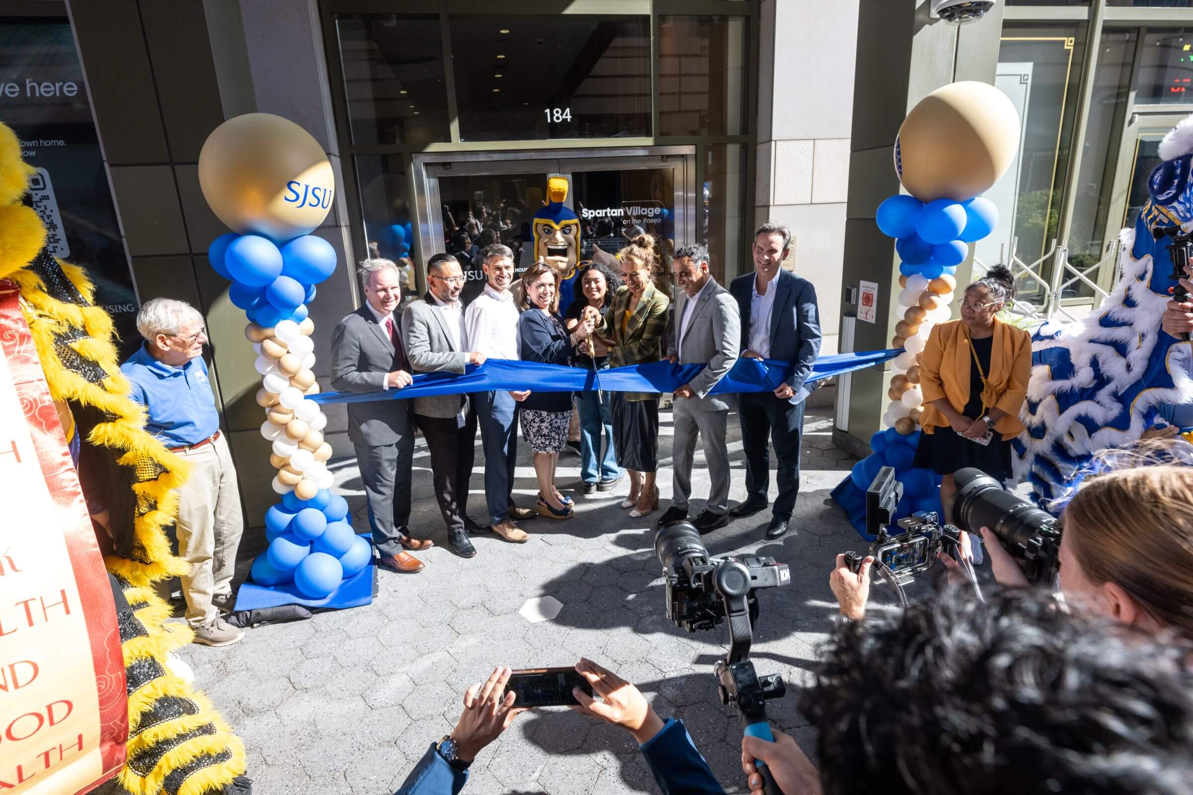 SJSU President Cynthia Teniente-Matson and others cutting ribbon