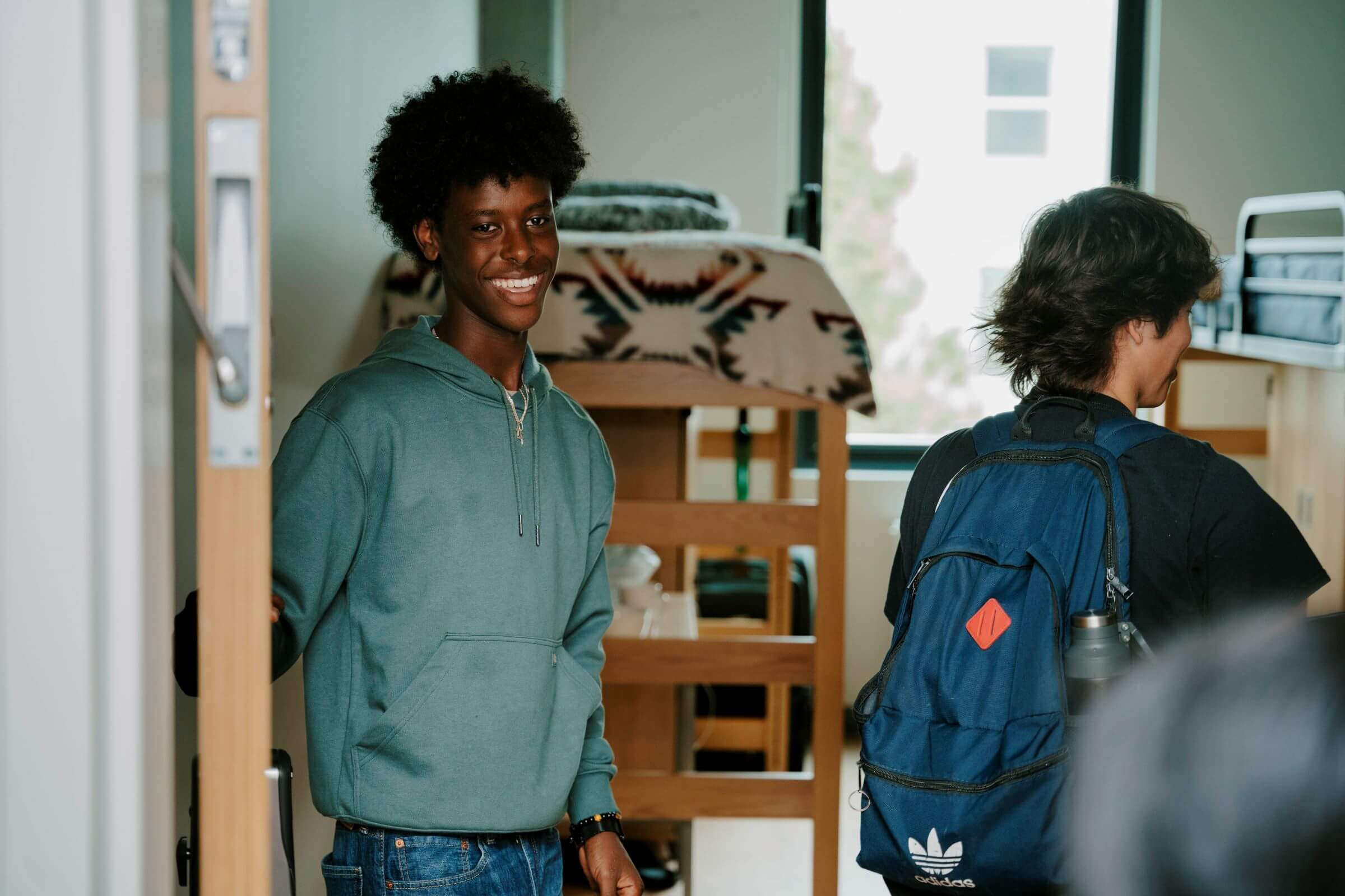 Students gather in a room at San Francisco State's new West Grove Commons residence hall