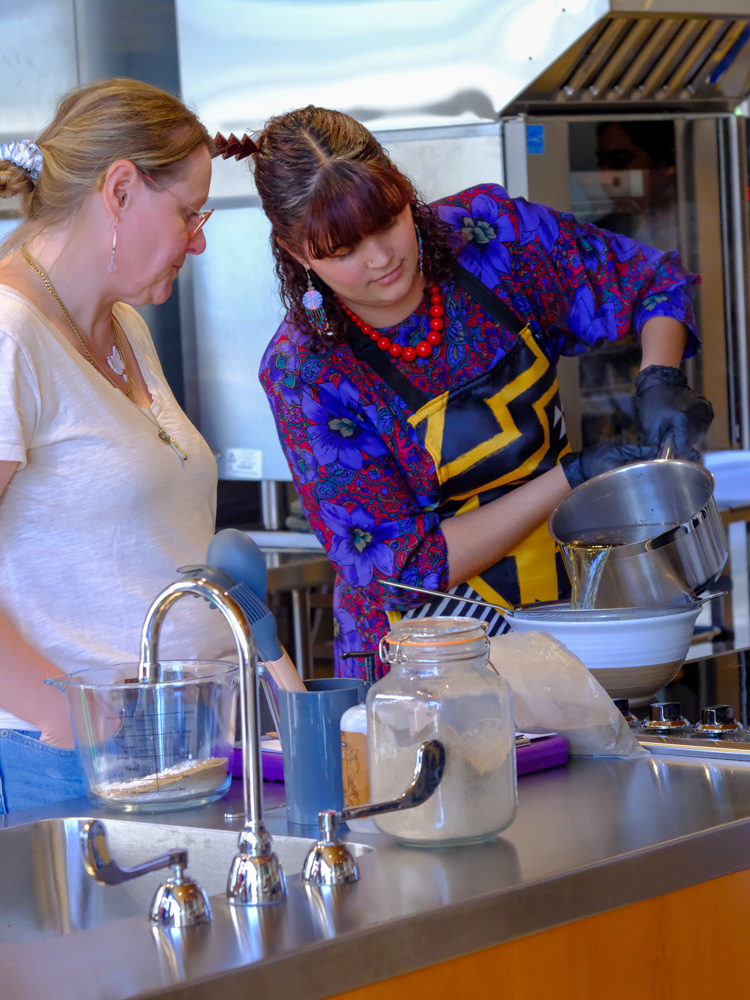 Workshop leaders demonstrate baking