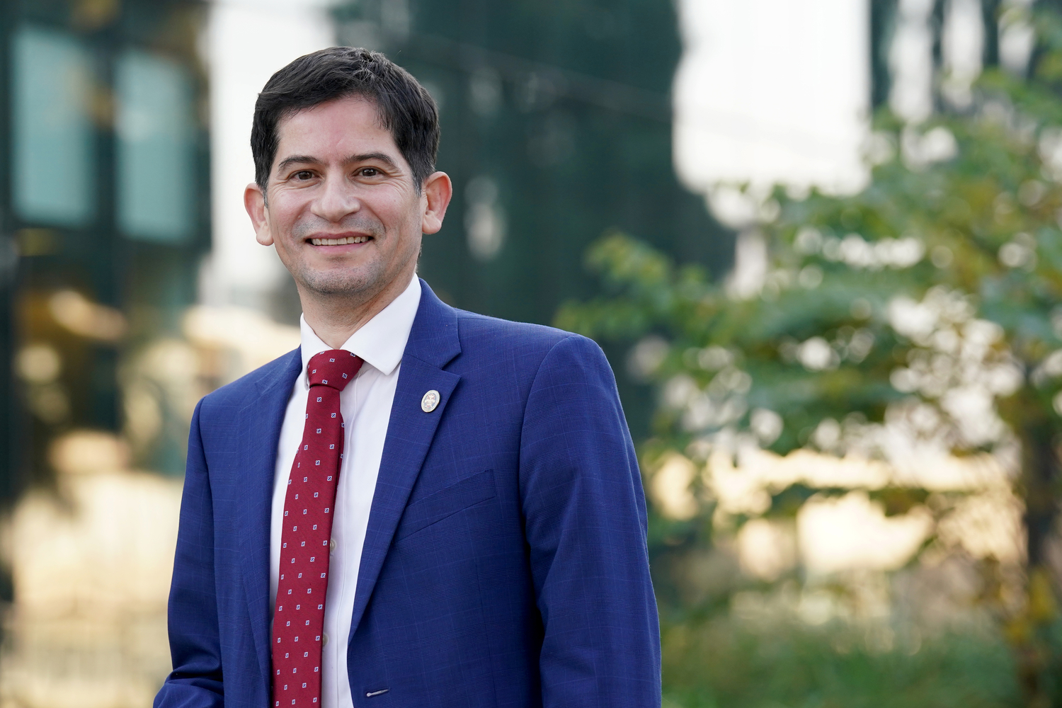 man in suit standing outside